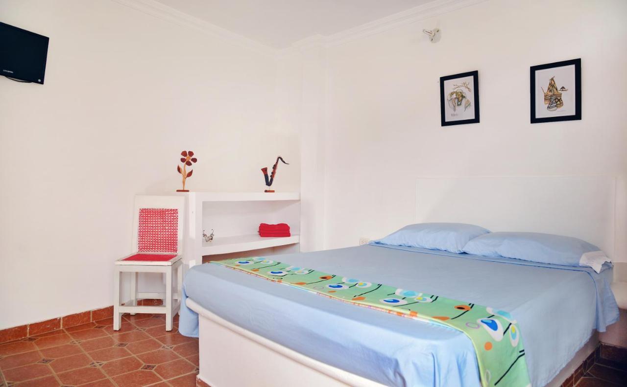 Hostal Dumbira ตากังกา ภายนอก รูปภาพ