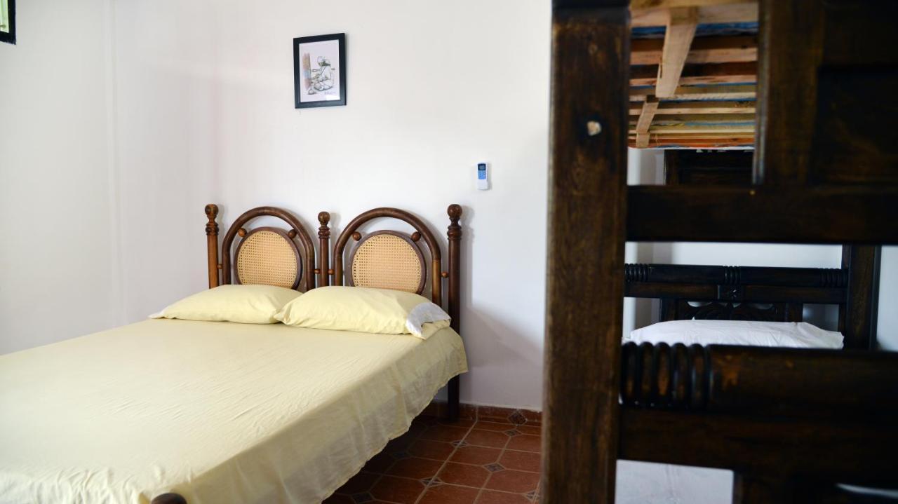 Hostal Dumbira ตากังกา ภายนอก รูปภาพ