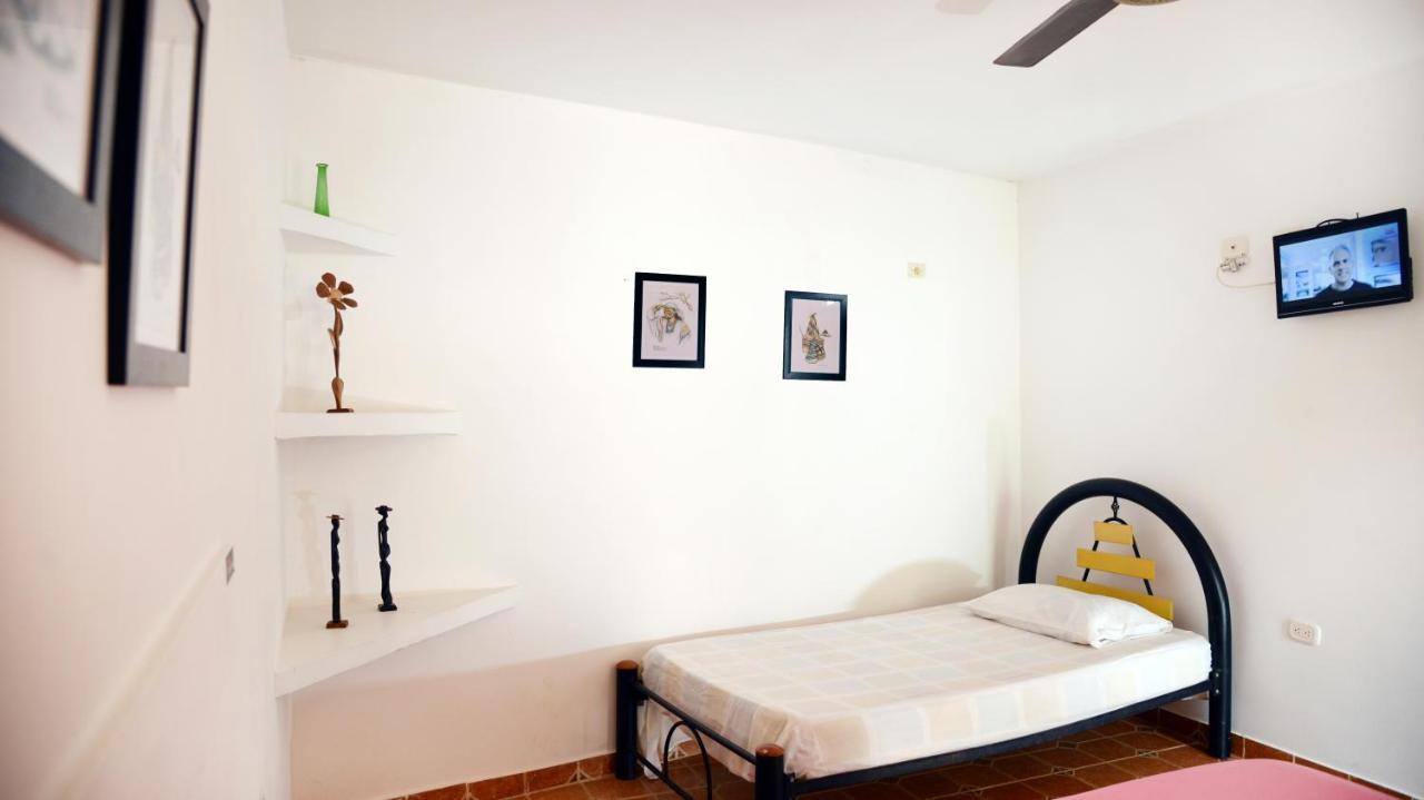 Hostal Dumbira ตากังกา ภายนอก รูปภาพ